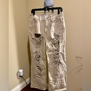 Forever 21 tan distressed jeans.  Size 29. Great condition.